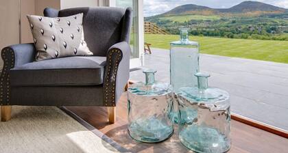 GRANARY, sleeps 8, superb barn conversion. Outstanding views, near to Melrose