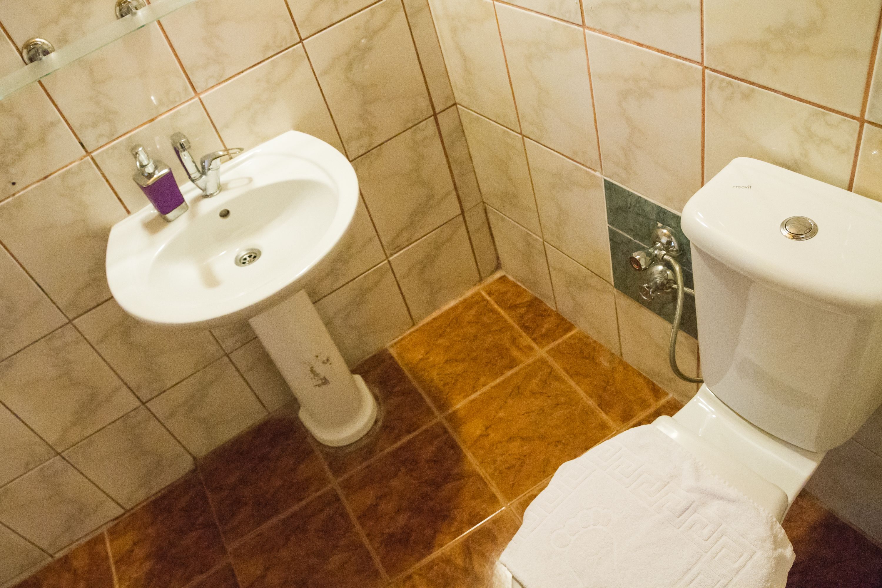 family condo | bathroom | shower, free toiletries, hair dryer, slippers