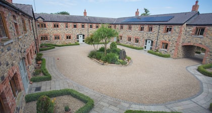 Three bedroom cottage in a landscaped courtyard set in the heart of Ireland's Ancient East region.