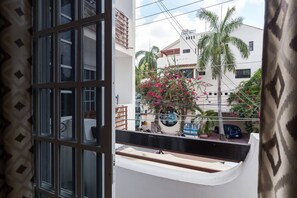 Enjoy a view of the surrounding neighborhood from the comfort of your room.