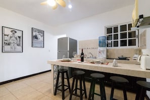 Fridge, microwave, stovetop, coffee/tea maker