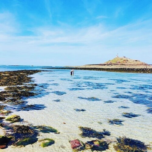 A 3 bedroom cottage that sleeps 6 guests with a heated covered pool