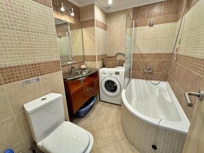 Ensemble douche/baignoire, serviettes fournies