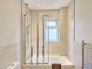 Combined shower/tub