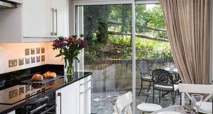 Das Coach House in der Nähe von Sevenoaks in ruhiger Lage mit Blick über Gärten, Paddock und Ackerland.