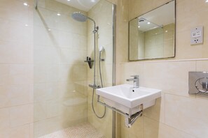 Combined shower/bathtub, hair dryer