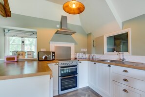 Fridge, microwave, oven, cookware/dishes/utensils