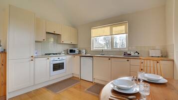 Fridge, microwave, oven, cookware/dishes/utensils