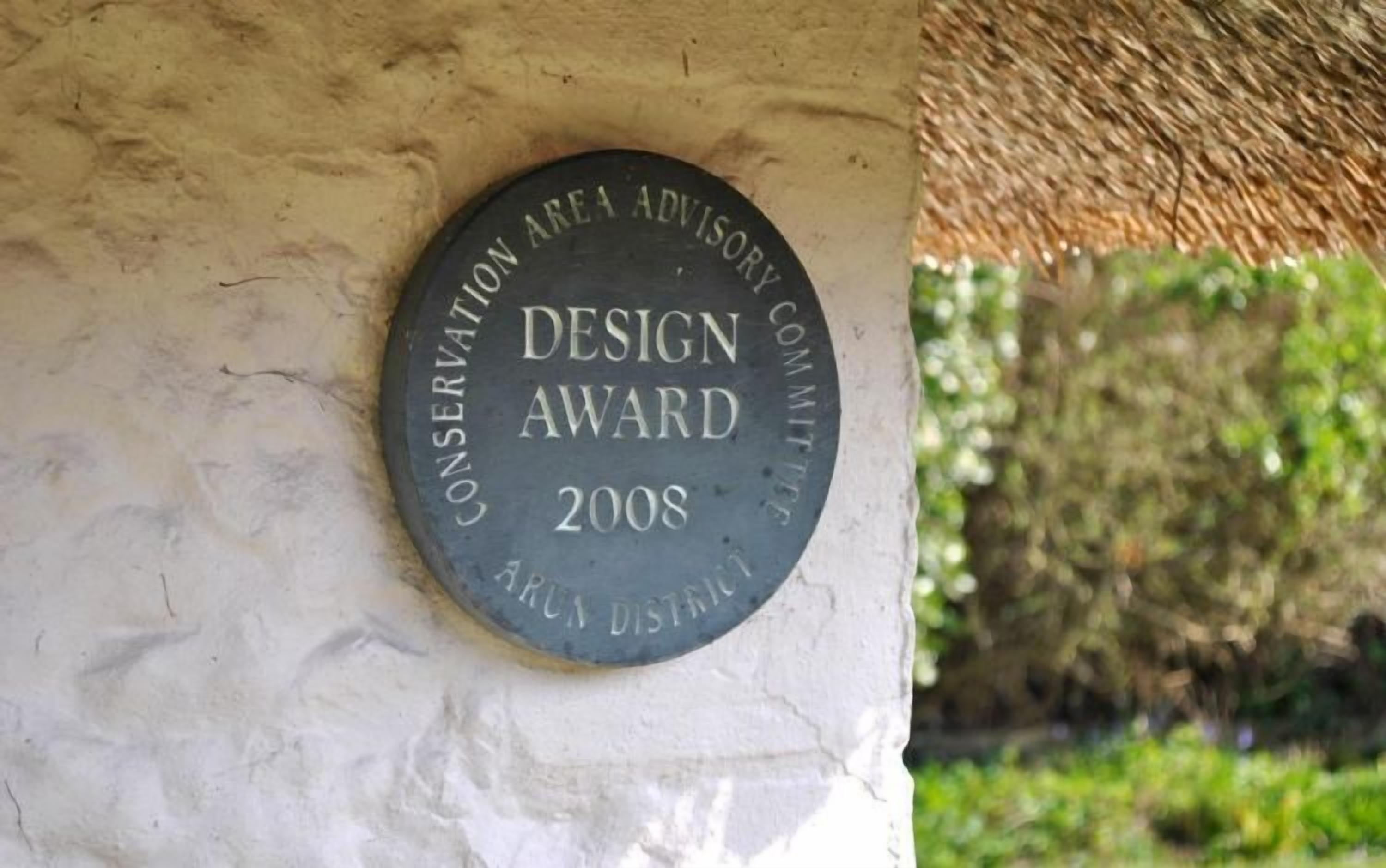 A plaque on a wall stating "Conservation Area Advisory Committee Design Award 2008".