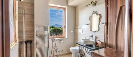 Bathtub, hair dryer, towels