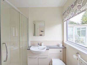 Combined shower/tub, hair dryer