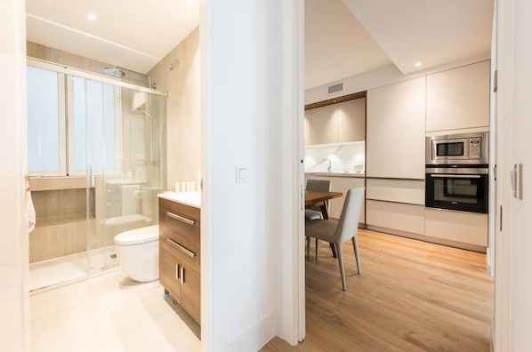 Shower, hair dryer, towels, soap