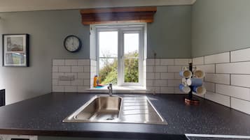 Fridge, microwave, oven, dining tables