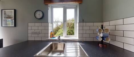 Fridge, microwave, oven, dining tables
