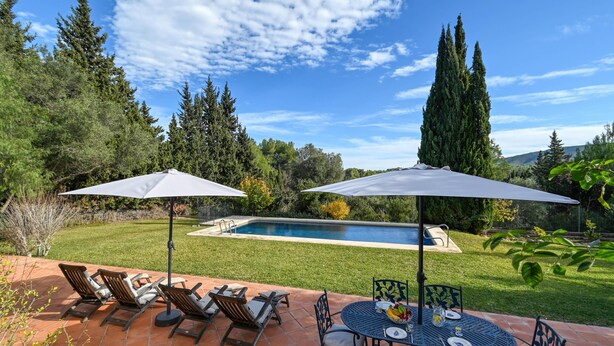 A patio area with a pool, outdoor seating, and a view of the surrounding landscape. - Villa in Javea, on the Costa Blanca, Spain with private pool for 6 persons (Javea)