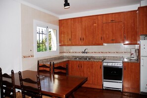 Fridge, oven, coffee/tea maker, toaster