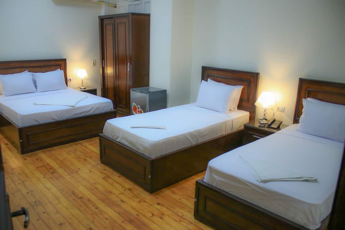 Superior Quadruple Room, City View | Minibar, in-room safe, iron/ironing board (on request), WiFi (free)