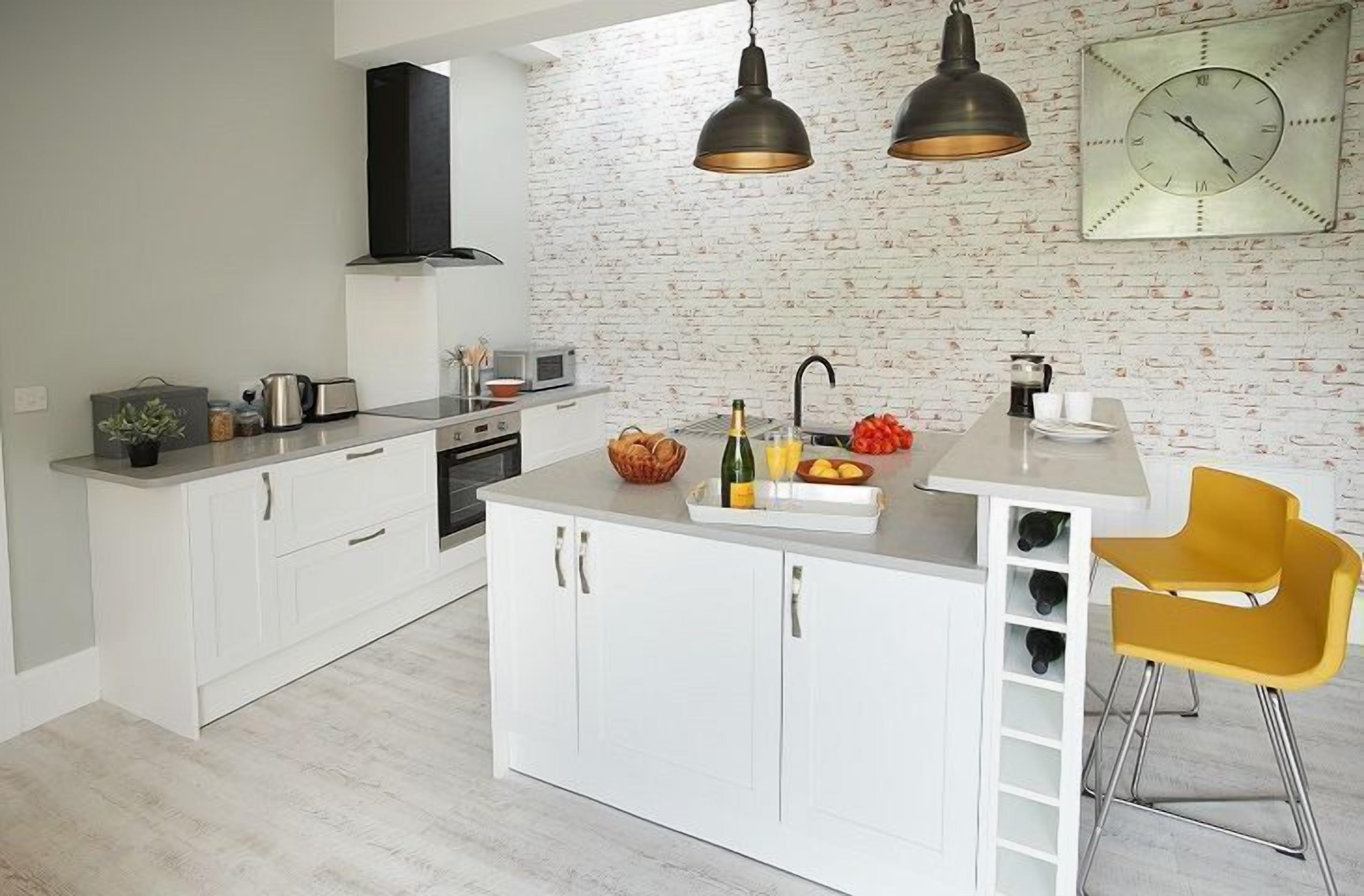Ground floor: Kitchen with island unit and breakfast bar