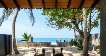 Red Parrot Beach Villa justo en la playa de arena blanca