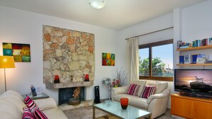 TV, fireplace, books - Large Pool & Garden, Billiard, Peaceful Area, Near to the Sea, Coral Bay Paphos (Peyia)