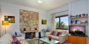 TV, fireplace, books - Large Pool & Garden, Billiard, Peaceful Area, Near to the Sea, Coral Bay Paphos (Peyia)