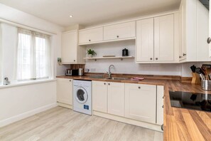 Fridge, microwave, oven, cookware/dishes/utensils