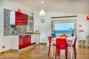 Fridge, stovetop, coffee/tea maker, high chair