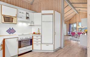 Fridge, stovetop, dishwasher, coffee/tea maker