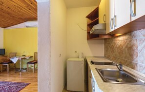 Fridge, stovetop, coffee/tea maker
