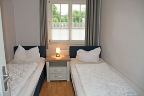 2 bedrooms, travel crib, WiFi, bed sheets