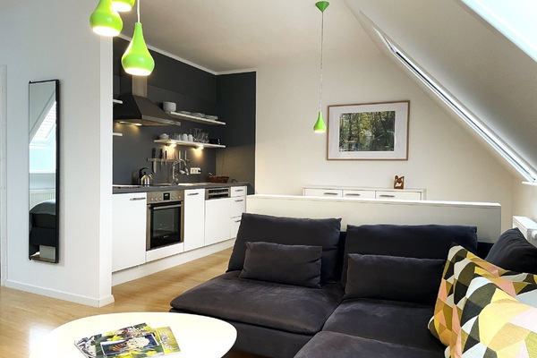 Kombinierter Wohn- und Aufenthaltsraum mit Küche