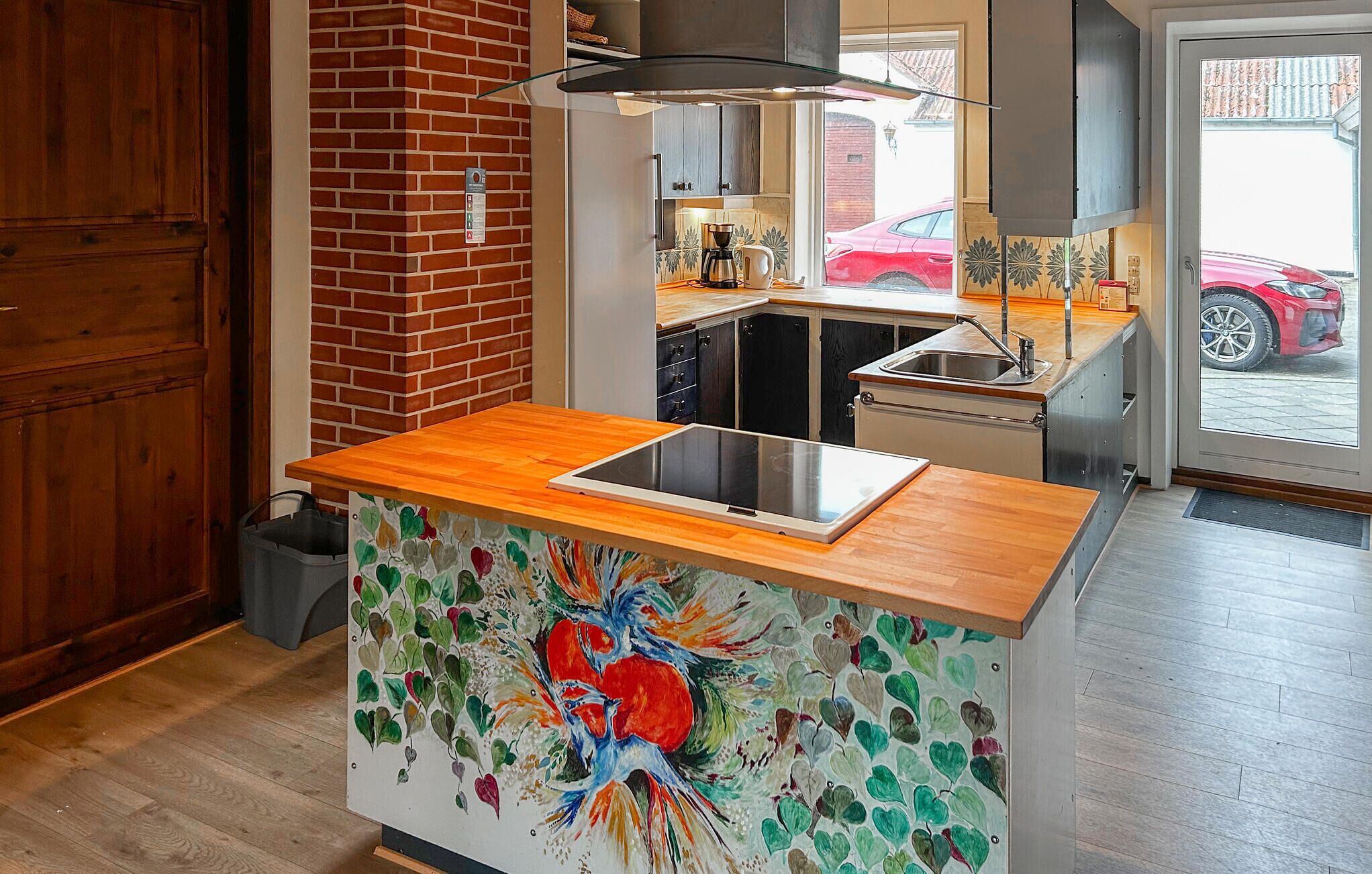 Fridge, stovetop, dishwasher, coffee/tea maker