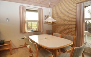 Enjoy meals in this cozy dining area with a large table and six chairs.
