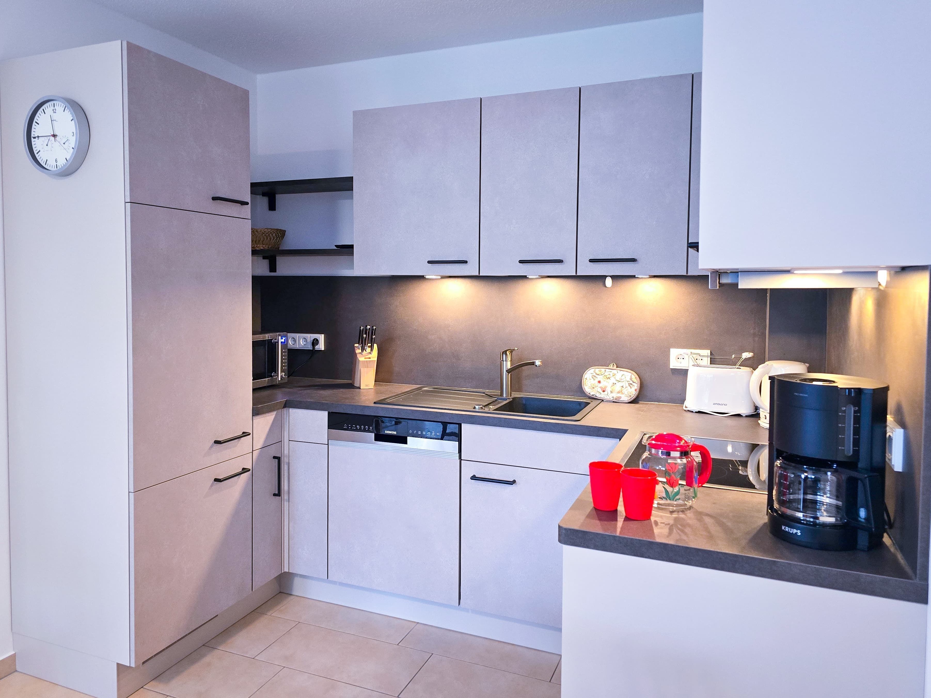Fridge, microwave, dishwasher, coffee/tea maker