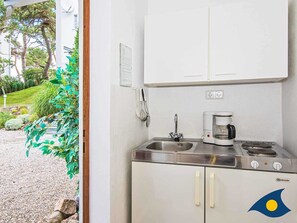 Fridge, coffee/tea maker, electric kettle, toaster