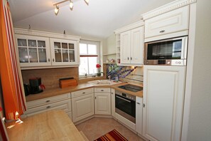 Refrigerador, microondas, horno y lavavajillas 