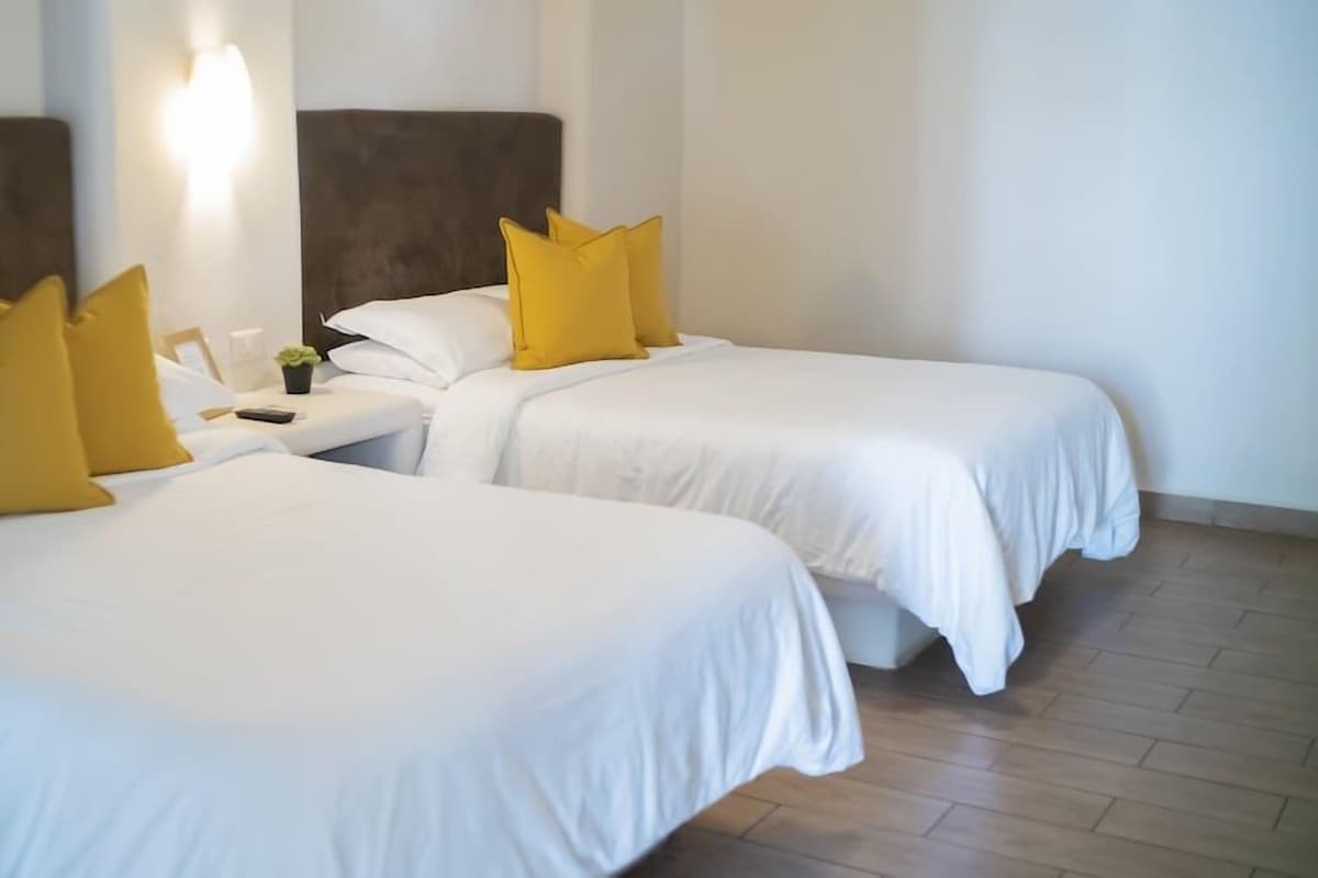 Laptop workspace, iron/ironing board, individually furnished, bed sheets