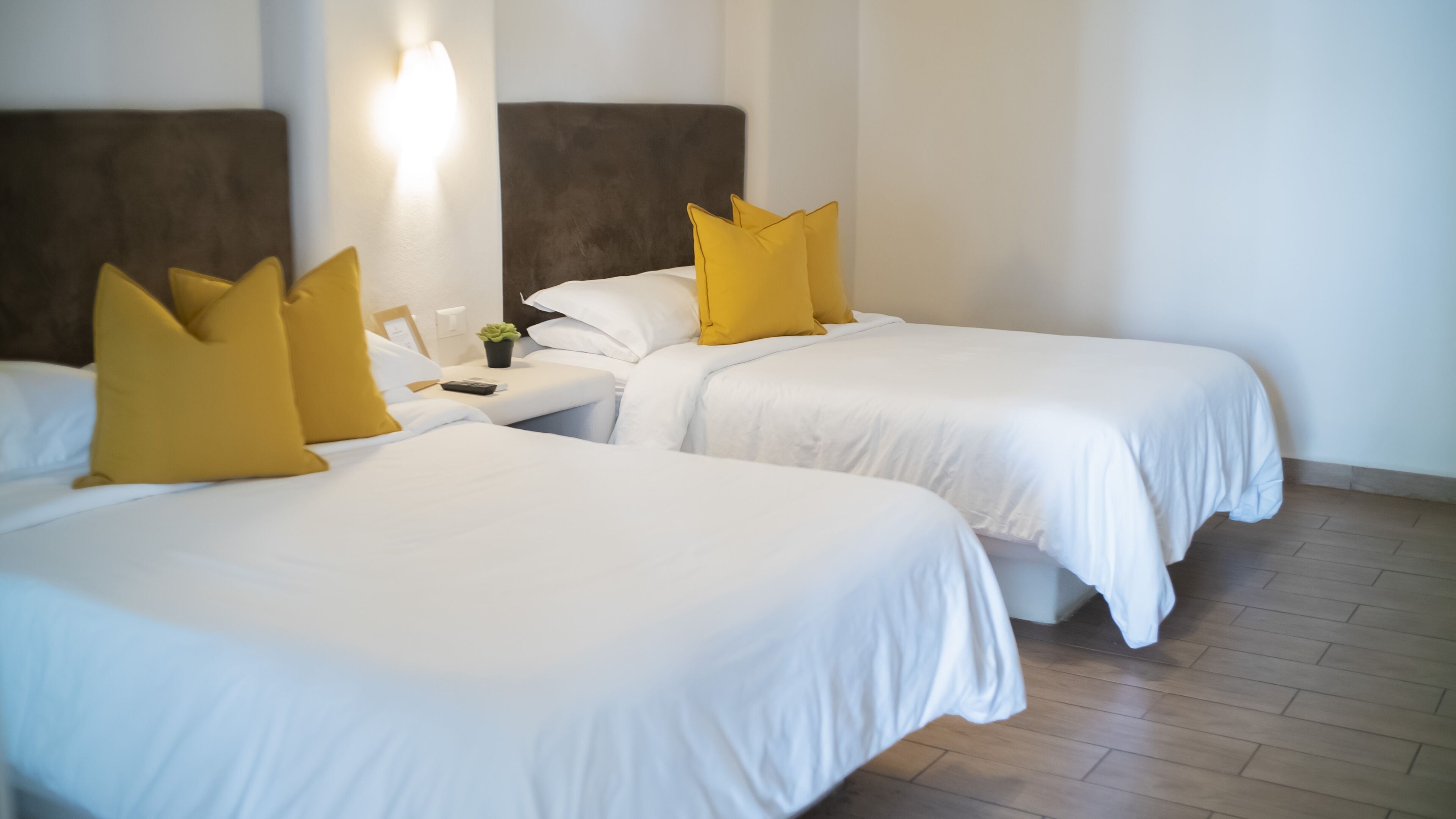 double room, 2 double beds | individually furnished, laptop workspace, iron/ironing board, bed sheets