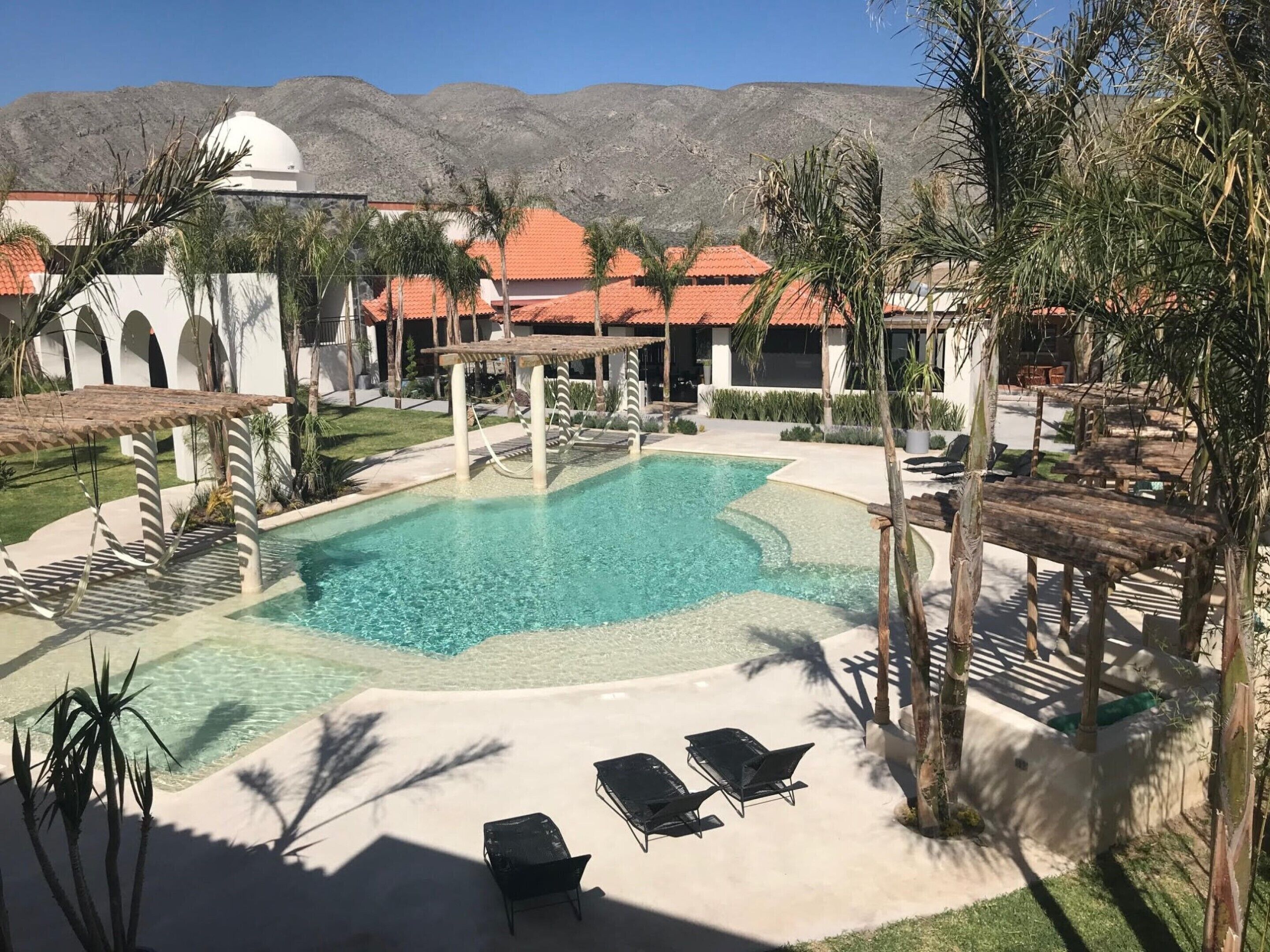 2 outdoor pools, open 10:00 am to 11:00 pm, pool loungers