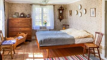 1 dormitorio y cuna de viaje