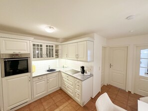 Fridge, oven, dishwasher, coffee/tea maker