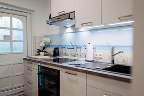 Fridge, oven, dishwasher, coffee/tea maker