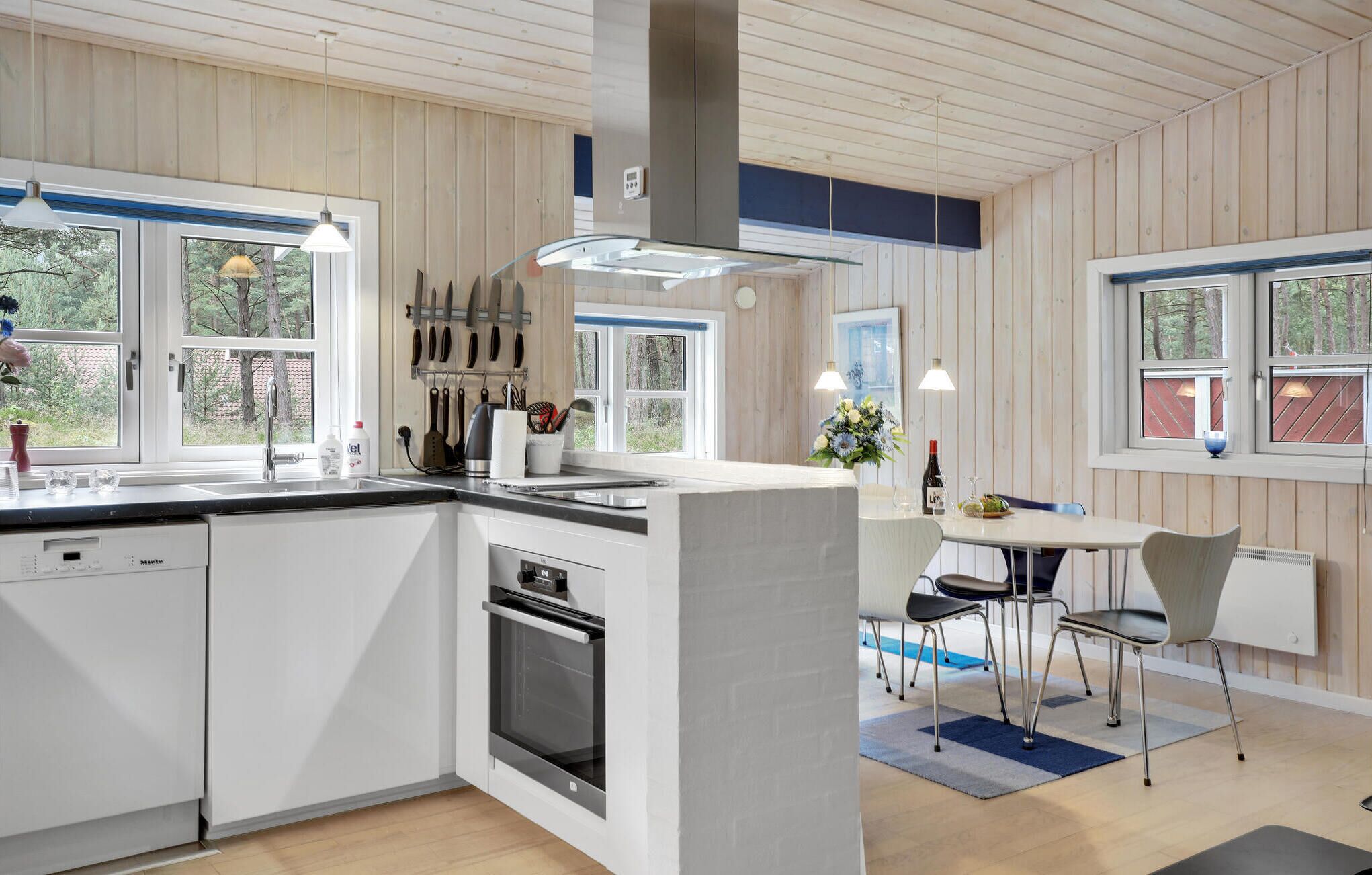 Fridge, stovetop, dishwasher, coffee/tea maker