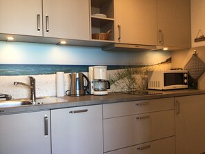 Fridge, microwave, dishwasher, coffee/tea maker