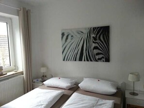 2 bedrooms, travel crib, WiFi, bed sheets