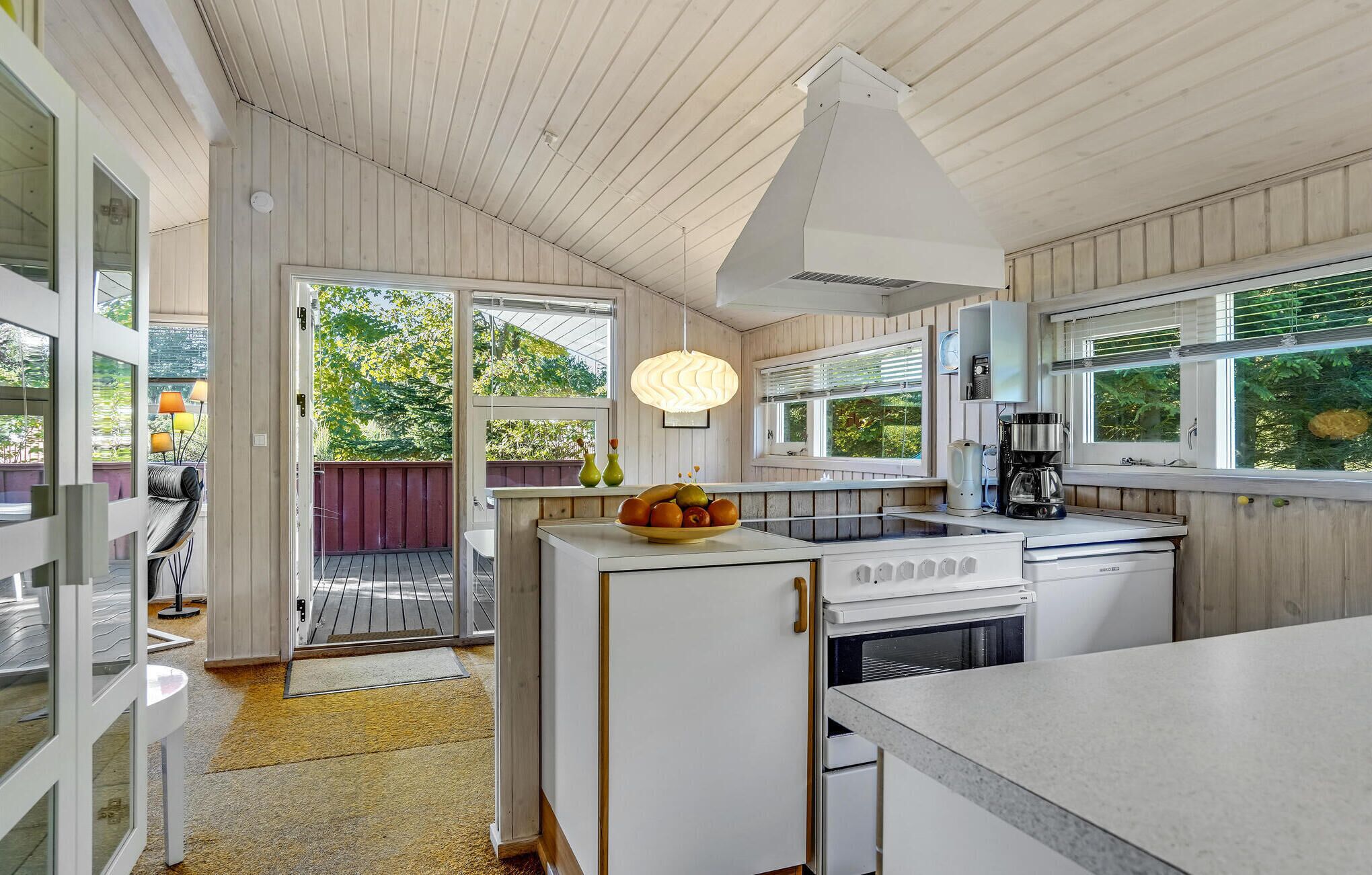 Fridge, stovetop, dishwasher, coffee/tea maker