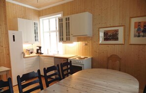 Fridge, stovetop, dishwasher, coffee/tea maker