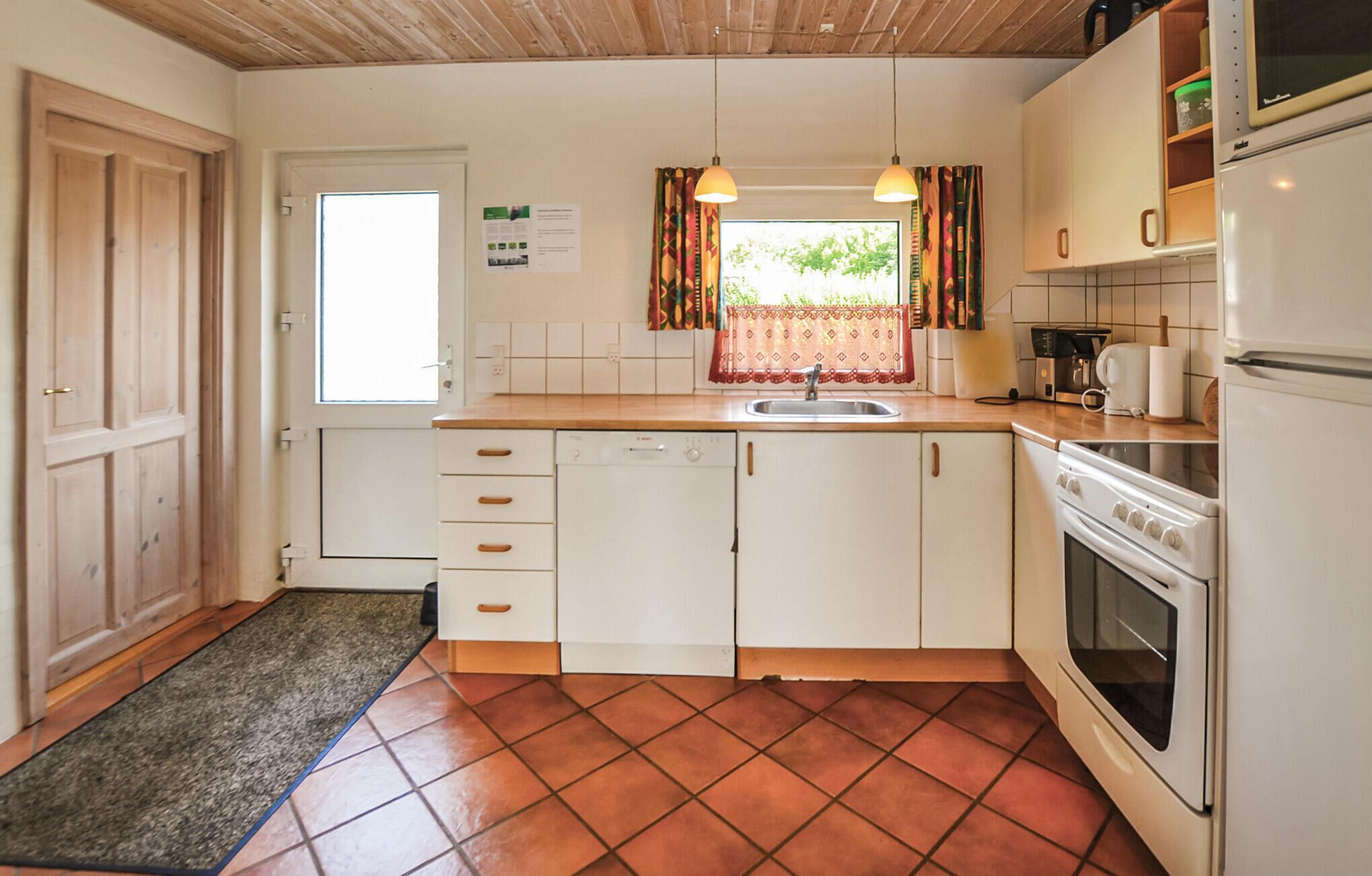 Coffee/tea maker, fridge, stovetop, dishwasher