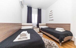 3 chambres, lit parapluie, Wi-Fi gratuit, draps fournis