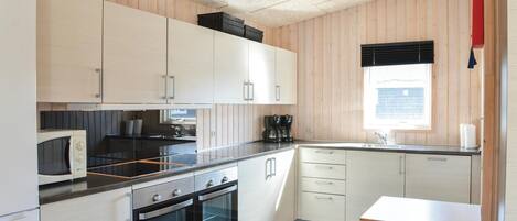 Fridge, stovetop, coffee/tea maker